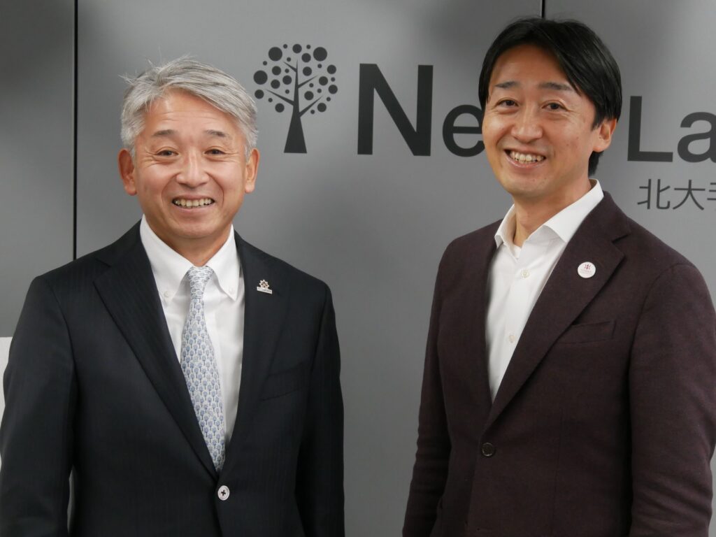 片山右京JCLチェアマン（写真左）、小林京太　三菱地所コンテンツビジネス創造部長