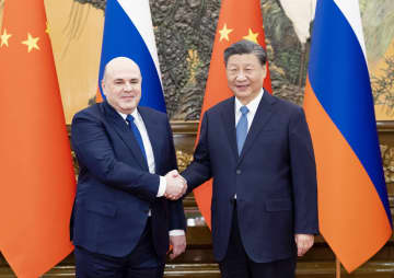 習氏、ロシアとの関係強化に意欲 首相と会談、経済で下支え　画像１
