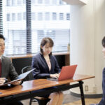 Asian manager business person interviewing